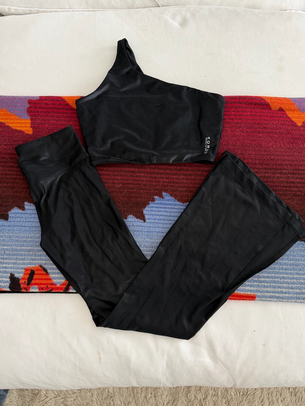 Koral black shiny one shoulder sports top and flared pant